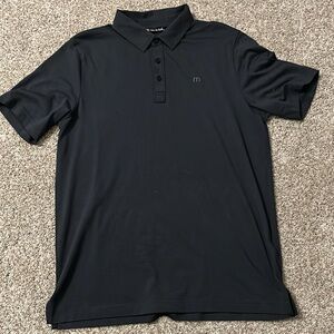 Travis Matthew navy blue men’s performance fabric polo, size M